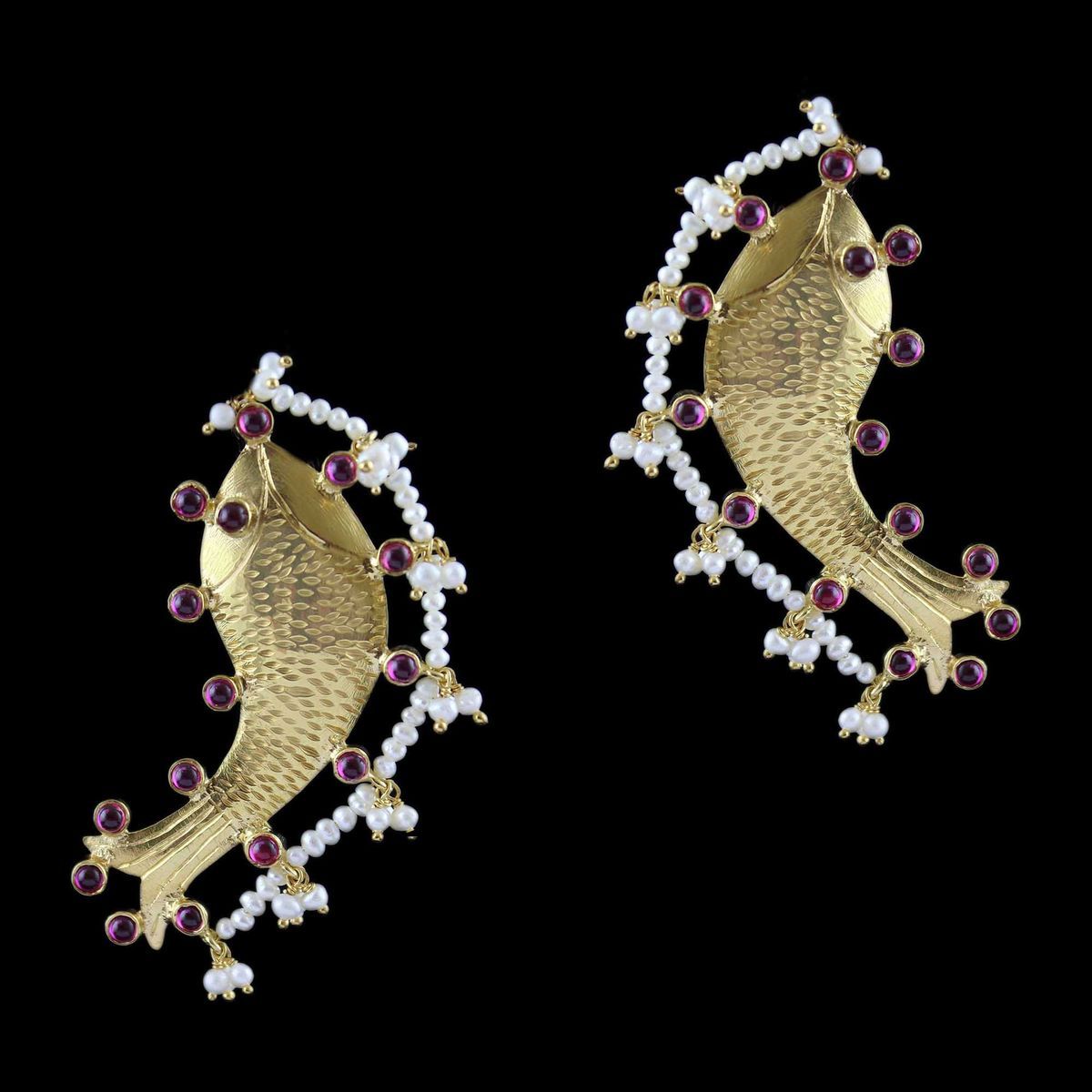 gold earrings fish design