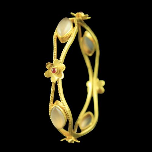 GOLD PLATED FLORAL DESIGN ONYX BANGLE