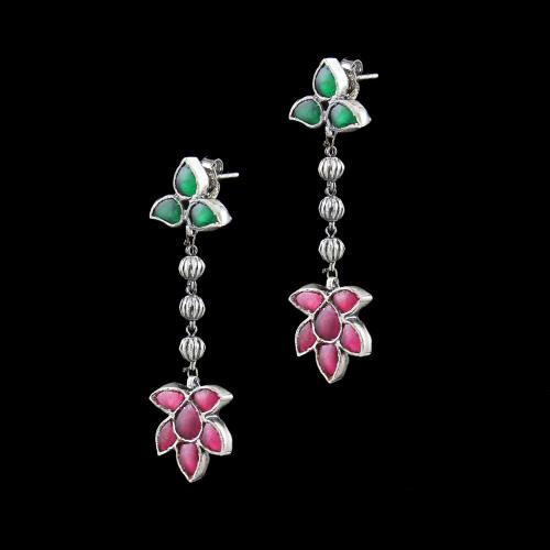 OXIDIZED SILVER FLORAL DROPS EARRINGS STUDDED RED CORUNDUM AND GREEN HYDRO STONES