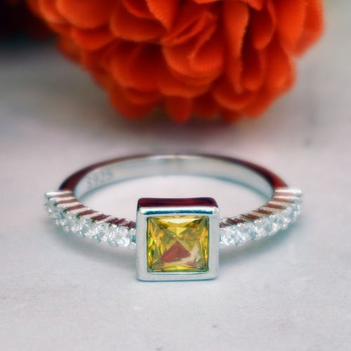 92.5 STERLING SILVER TOPAZ AND CZ RING
