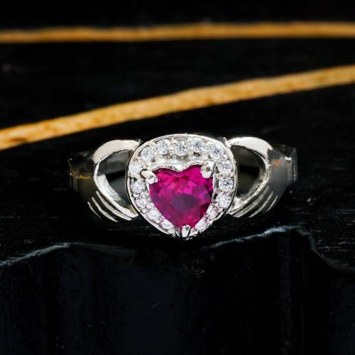 STERLING SILVER RED CORUNDUM AND CZ RING