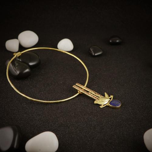 GOLD PLATED SILVER BIRD NECKLACE WITH CHAMPION AND LAPIS LAZULI STONES