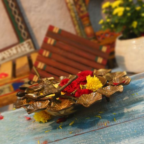 BRASS URLI FLOWER WITH ANTIQUE FINISH